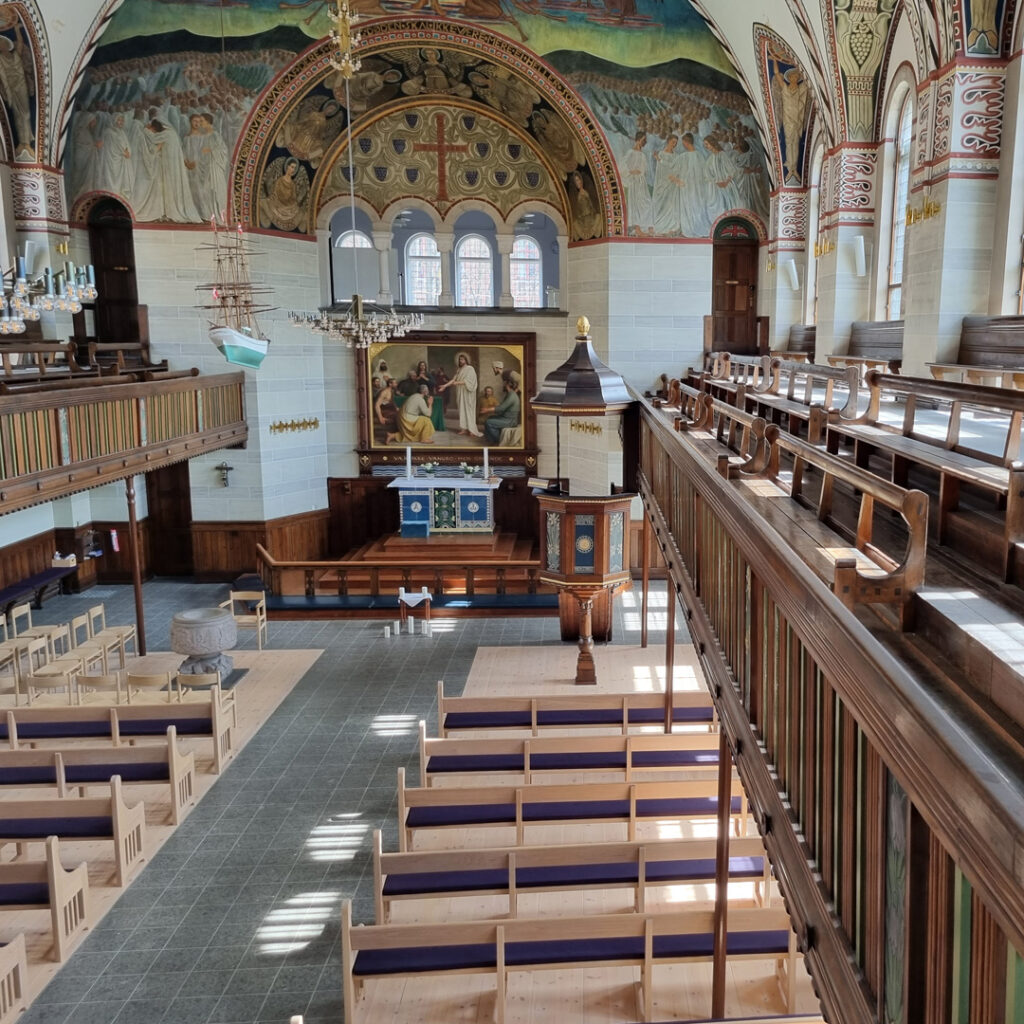 New and old church pews in Sion's Church in Copenhagen. Photo JW 2023