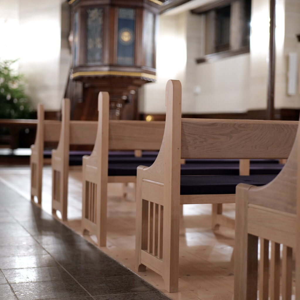 Solid oak church pews (benches) designed for Sion's Church in Copenhagen, 2022. Design: Dorte Wassard og Jacob Würtzen